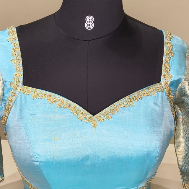 Turquoise Silk Zari Sweetheart Blouse photographed on a dress form at the Ananta Designs boutique